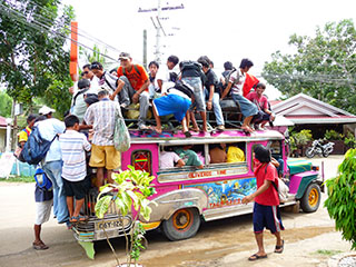 Jeepney overcrowded and overly-decorated